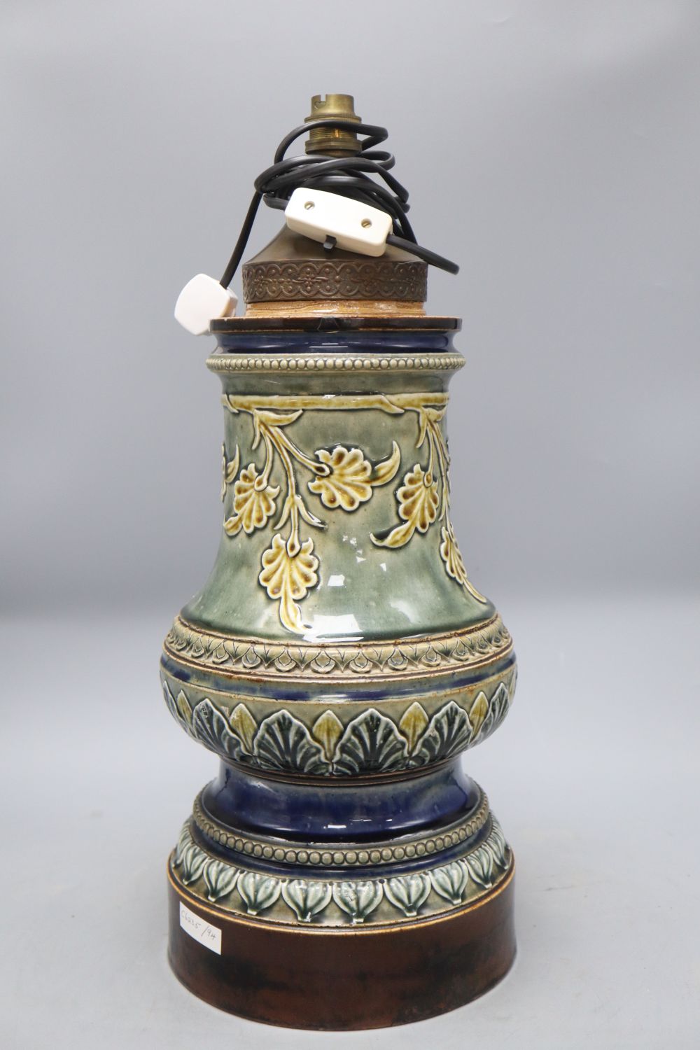 A large Doulton style stoneware lamp base, overall height 50cm